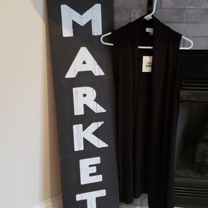 Long sleeveless vest